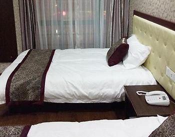 Xinhongbin Grand Hotel Binjiang Bagian luar foto